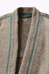 Jacket in faux fur with embroidery on the back